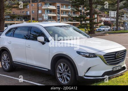 2020 modèle blanc Mazda CX9 stationné au parking de Newport Beach à Sydney, Nouvelle-Galles du Sud, Australie Banque D'Images