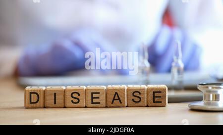 Word maladie collectée de cubes de bois dans brut Banque D'Images
