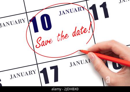 10th jour de janvier. Dessiner à la main une ligne rouge et écrire le texte Enregistrer la date sur le calendrier date 10 janvier. Concept mois d'hiver, jour de l'année. Banque D'Images