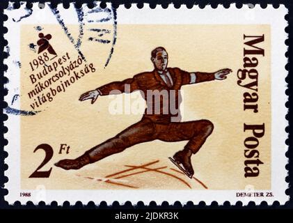 HONGRIE - VERS 1988: Timbre imprimé en Hongrie dédié aux Championnats du monde de patinage artistique 1988, Budapest, homme, vers 1988 Banque D'Images