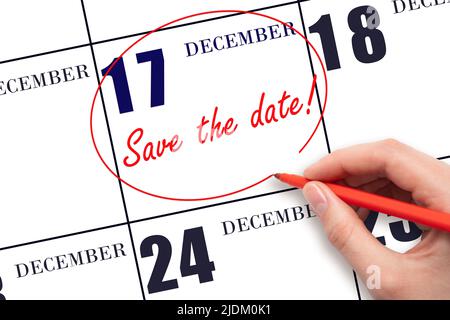 17th jour de décembre. Dessiner à la main une ligne rouge et écrire le texte Enregistrer la date sur le calendrier date 17 décembre. Concept mois d'hiver, jour de l'année. Banque D'Images