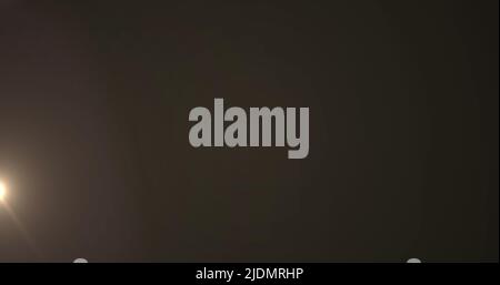 Image de taches lumineuses sur fond noir Banque D'Images