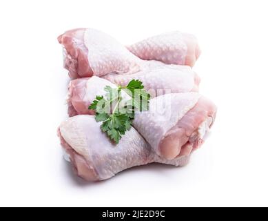 Pattes de poulet brutes isolées sur blanc Banque D'Images
