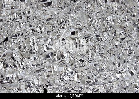 gros plan sur la texture de la feuille d'argent froissés. Arrière-plan abstrait Banque D'Images