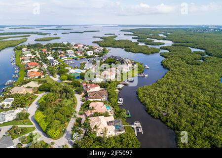 Fort ft. Myers Florida,Connie Mack Island clôturé communauté privée maisons aménagement empiétement,marécages Punta Rassa Cove Golfe du Mexique,aeria Banque D'Images