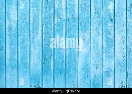 Fond de texture en bois bleu pastel. Mur de l'ancien bâtiment aux intempéries. Image en tons. Banque D'Images