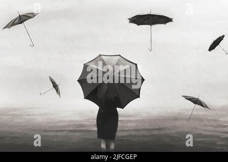 femme surréaliste avec parapluie sous la pluie avec parapluies noires volantes autour Banque D'Images