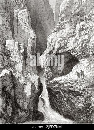 Grotte et cascade d'Edelfraugrab, ou tombe de la Noble Dame, Forêt Noire, État du Bade-Wurtemberg, Allemagne. Europe. Voyage dans la Forêt Noire par Alfred Michiels 1867 au départ du Tour du monde 1867 Banque D'Images