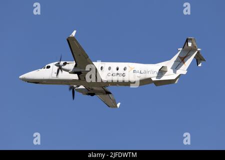 Montréal, Canada. 25th mai 2022. A PAL Airlines Beechcraft 1900D décollage de l'aéroport international Pierre Elliott Trudeau de Montréal. PAL Airlines est une compagnie aérienne régionale canadienne dont le siège social est situé à l'aéroport international de St. John's. PAL offre des services réguliers de transport de passagers, de fret, d'ambulance aérienne et d'affrètement. PAL est la branche aérienne commerciale du groupe d'entreprises PAL. (Photo de Fabrizio Gandolfo/SOPA Images/Sipa USA) crédit: SIPA USA/Alay Live News Banque D'Images