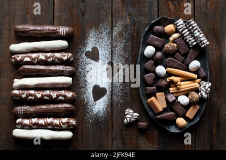 Bonbons au chocolat sur fond sombre Banque D'Images