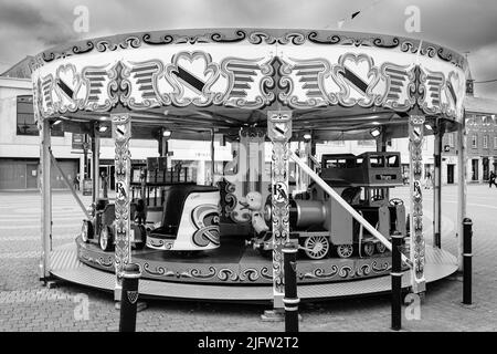 Carrousel pour enfants sur Lemon Quay, Truro, Cornwall Banque D'Images