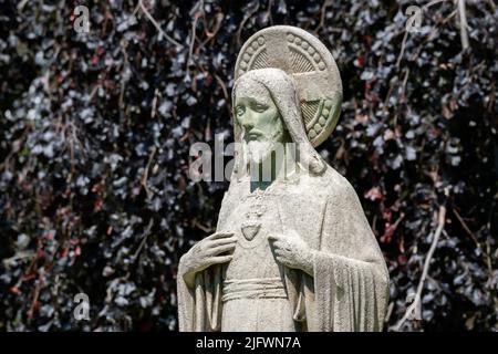 Statue du Sacré-cœur de Jésus-Christ dans la cour de Begijnhof, Amsterdam Banque D'Images