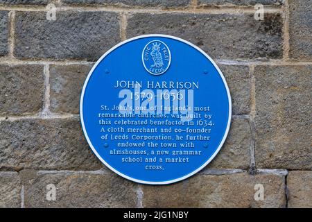 Plaque bleue à John Harrison, (1579-1656) un marchand de tissus et cofondateur de Leeds Corporation dans le centre-ville de Leeds, West Yorkshire, Royaume-Uni. Banque D'Images