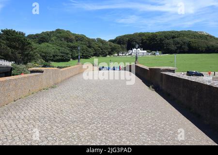 L'ancien pont routier traversant la rivière Ax à Axmouth. Il a été remplacé en 1990 et est le plus ancien pont en béton d'Angleterre. Banque D'Images