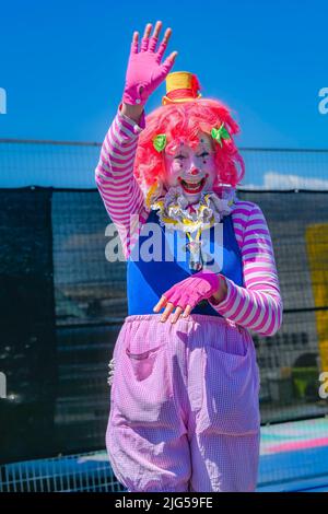 Tickles le clown, en orvant Bonjour. Banque D'Images