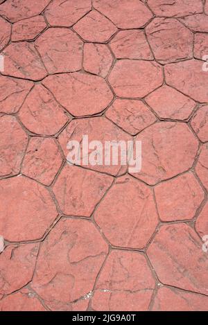sol carrelé rougeâtre inégal avec joints, texture de fond en ciment vectoriel Banque D'Images