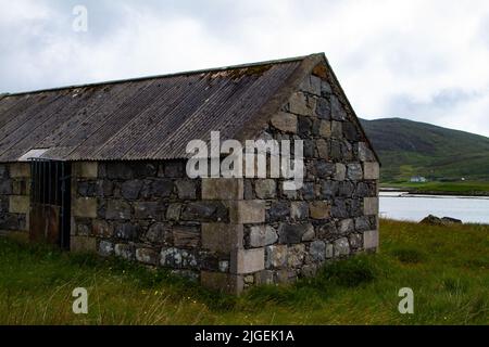 Disused byre, Loch Eynort, South Uist, Hebrides Banque D'Images