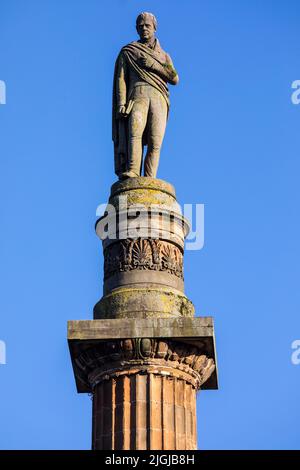 Glasgow, Écosse - 15 octobre 2021 : monument Sir Walter Scott situé sur la place George à Glasgow, Écosse. Scott était un romancier écossais historique Banque D'Images