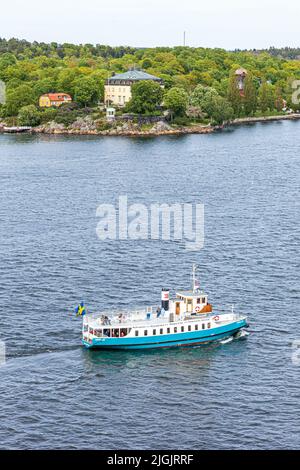 Le ferry MS Emelie quitte Stockholm et arrondit l'île Djurgården à l'archipel de Stockholm, en Suède Banque D'Images