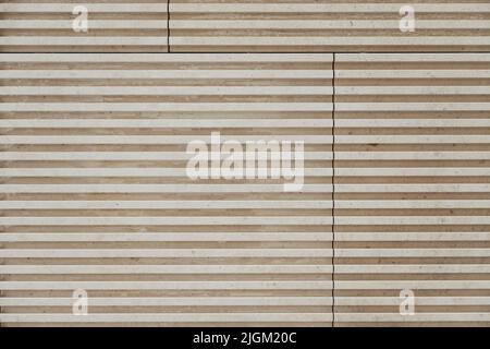 Carreaux de pierre. Façade de maison en Bardage. Maçonnerie. Mur brun Banque D'Images