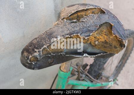 Siège de vélo cassé Banque D'Images