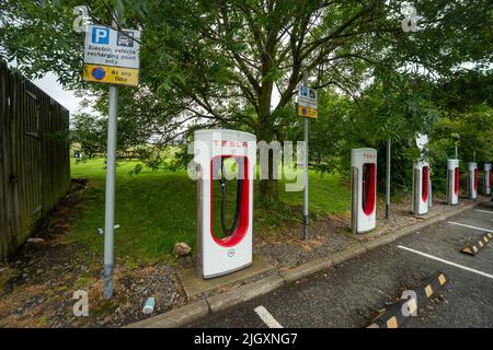 Points de recharge Tesla Supercharger, Welcome Break Services Abington, Écosse, Royaume-Uni Banque D'Images