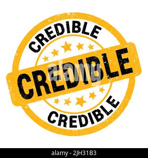 Texte CRÉDIBLE écrit sur le timbre jaune-noir grungy. Banque D'Images