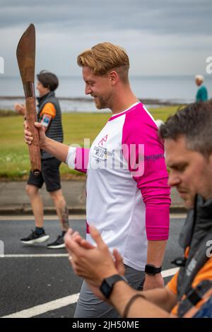 Queens Baton Relay, Birmingham 2022, Whitley Bay, North Tyneside, Angleterre, ROYAUME-UNI. Banque D'Images