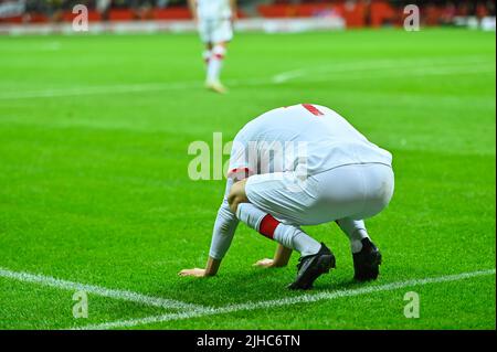 Footballeur après une fusillade manquante pendant le match de football. Banque D'Images