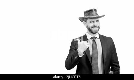 Regardez ceci. Publicité de l'homme de point de doigt de côté. Expert en publicité dans chapeau de cow-boy Banque D'Images