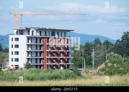 Construction de maisons résidentielles. Construction basse. Grue sur le chantier Banque D'Images