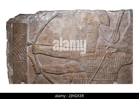 Guerriers assyriens attaquant une ville ennemie - détail d'une scène plus grande - relief du palais de Tiglath-Pileser III à Kalhu ( Nimrud ). 8th siècle avant J.-C. Banque D'Images