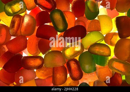 Motif de bonbons. Silhouette de nombreux bonbons multicolores aux couleurs vives et aux formes différentes. Banque D'Images