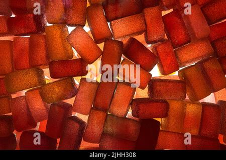 Motif de bonbons. Silhouette de nombreux bonbons multicolores aux couleurs vives et aux formes rectangulaires différentes. Banque D'Images