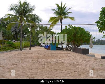 Beach volley Net sur sable à la plage de Phuket Island Resort Banque D'Images