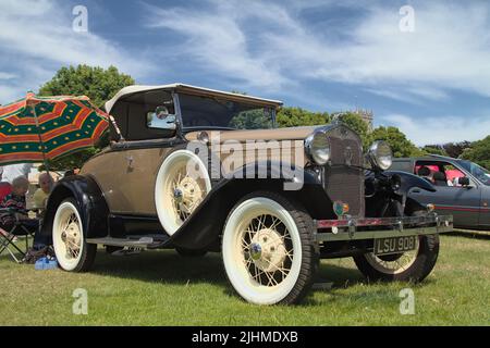 Vue latérale d'Un Ford modèle A 1930 Deluxe Roadster Vintage Classic Cabriolet Motor car, Christchurch, Royaume-Uni Banque D'Images
