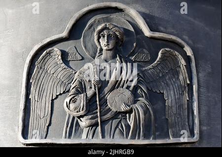 Grugeage en Ange sur la surface métallique Banque D'Images