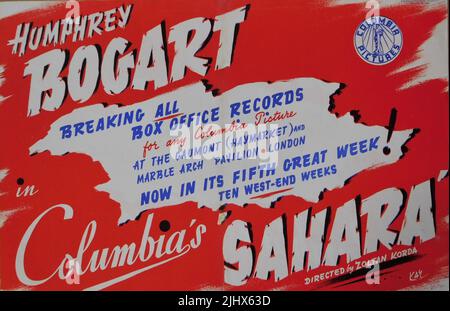 British Trade ad de janvier 1944 pour une course record à Londres de HUMPHREY BOGART au SAHARA 1943 réalisateur ZOLTAN KORDA scénario John Howard Lawson et Vincent Korda basé sur l'incident du film soviétique la treize musique Miklos Rozsa Columbia Pictures Banque D'Images