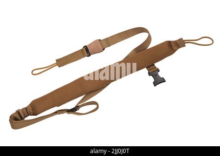 Bandoulière en nylon pour un pistolet isolé sur fond blanc. Ceinture pour un transport confortable des armes. Banque D'Images