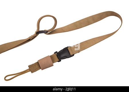 Bandoulière en nylon pour un pistolet isolé sur fond blanc. Ceinture pour un transport confortable des armes. Banque D'Images