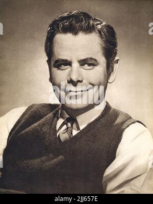 Vintage 1951 photo de publicité de l'acteur de cinéma hollywoodien Glenn Ford. Banque D'Images