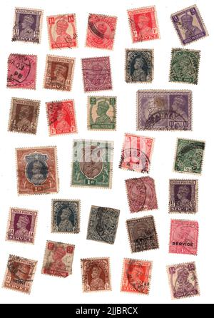 Une sélection de George VI a utilisé des timbres-poste de l'Inde sur fond blanc. Banque D'Images