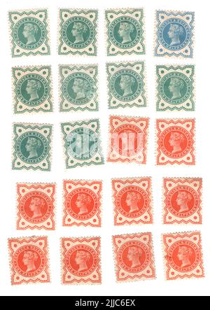 Une sélection de timbres-poste Victorian Half Penny Mint GB sur fond blanc. Banque D'Images