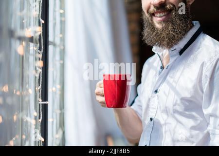 bonjour nouveau jour souriant homme mug Banque D'Images