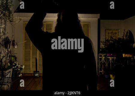 une photo de fille avec silhouette de guitare Banque D'Images