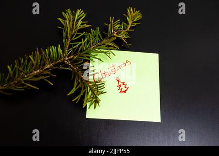 Un gros plan du message de Noël sur un morceau de papier Banque D'Images