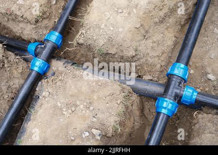 Système d'irrigation souterrain, installation de drainage de l'eau de plomberie Banque D'Images