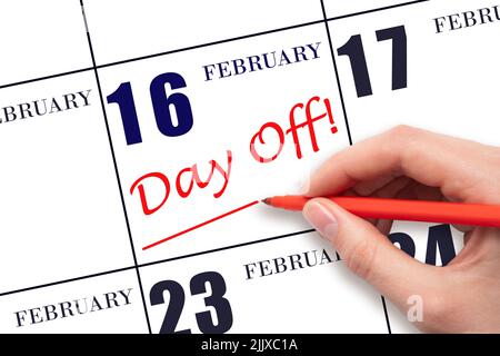16th jour de février. Écrire du texte à la main JOUR de fin et dessiner une ligne à la date du calendrier 16 février. Concept de planification des vacances. Mois d'hiver, jour de l'an Banque D'Images