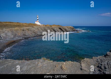 Vue du phare rayé de Far de Favaritx sur le promontoire rocheux, Carretera Favaritx, Minorque, Iles Baléares, Espagne, Méditerranée, Europe Banque D'Images