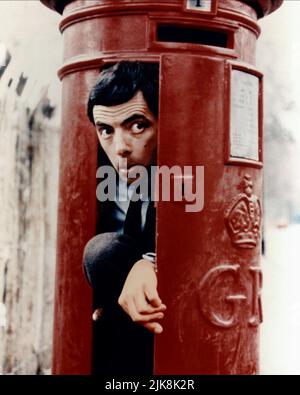 Rowan Atkinson dans Post Box film Mr Bean (1993) personnages : MR. BEAN 01 mai 1993 **AVERTISSEMENT** cette photographie est réservée à un usage éditorial et est la propriété de TIGER ASPECT et/ou du photographe désigné par le film ou la société de production et ne peut être reproduite que par des publications dans le cadre de la promotion du film ci-dessus. Un crédit obligatoire pour TIGER ASPECT est requis. Le photographe doit également être crédité lorsqu'il est connu. Aucune utilisation commerciale ne peut être accordée sans autorisation écrite de The film Company. Banque D'Images
